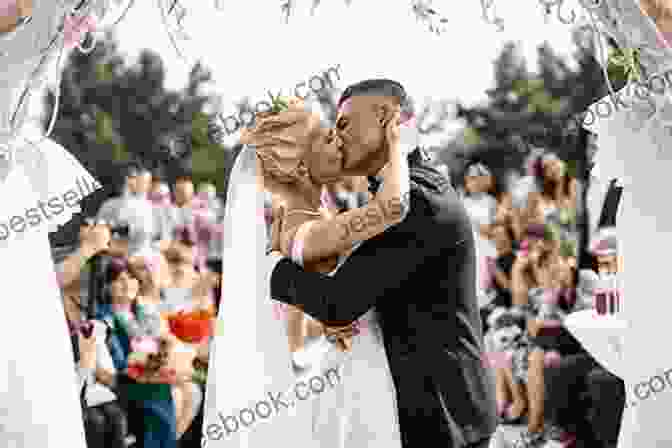 A Bride And Groom Kissing On Their Wedding Day The Knot Handbook George Lewis