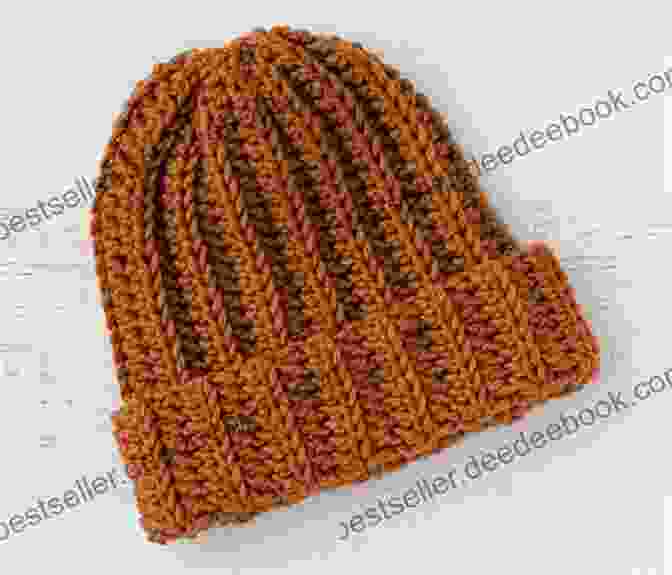 A Crochet Hat In Shades Of Red And Orange, Inspired By The Volcanoes Of Iceland Northern Lights Crochet: 10 Crochet Projects Inspired By Iceland S Beauty