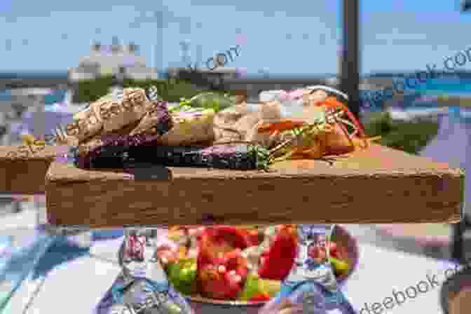 A Spread Of Traditional Greek Dishes, Including Grilled Octopus, Feta Cheese, And Olives From A Year In Greece