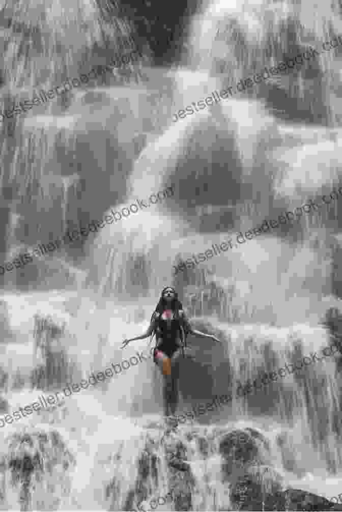 A Woman Stands Beneath A Cascading Waterfall, Her Body Enveloped In The Cool Water, Her Hair Flowing Behind Her. 30 Fabulous Hi Def Photos Of Females Vol 3 Women And Water #2 (Fabulous Hi Def Fotos Of Females)