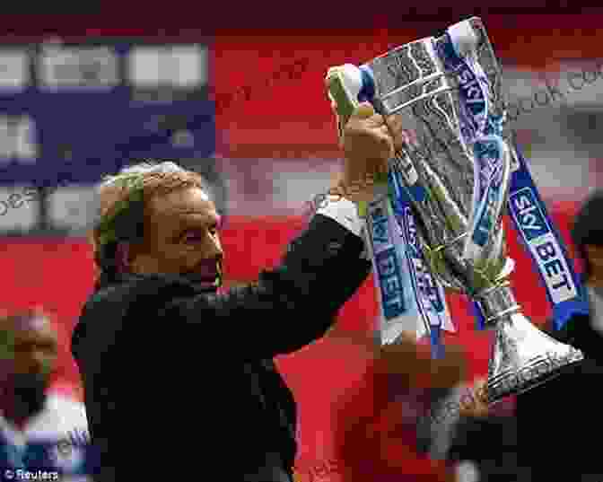 Harry Redknapp, A Smiling, Charismatic Man In A Suit, Holding A Trophy The Legend Of Napoleon Harry Redknapp