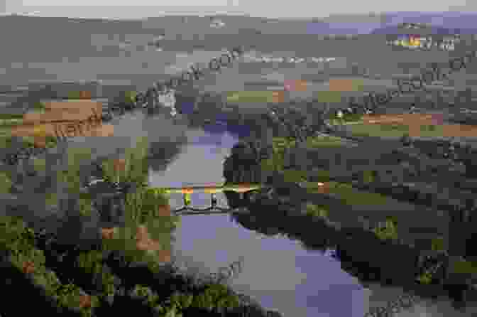 The Tranquil Dordogne River, Flowing Through The Heart Of The Region Chateaux Et Villes Lot Dordogne Correze